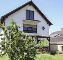 Mehrfamilienhaus mit 3 Einheiten und Garage in Wörth-Maximiliansau - Wörth am Rhein