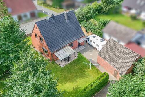 Luftbild - 5 Zimmer Einfamilienhaus zum Kaufen in Hohenlockstedt