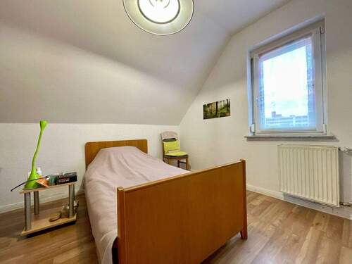 Vermietete_DG_Einheit_Schlafzimmer - 