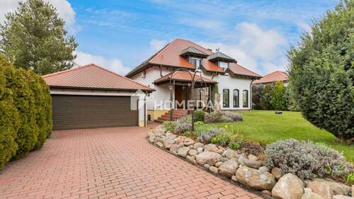 Außenansicht 1 - Exklusives Einfamilienhaus mit gehobener Ausstattung, vielen Highlights und separatem Baugrundstück