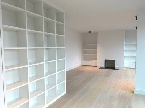 Wohnbereich mit Kamin - 5 Zimmer Etagenwohnung zum Kaufen in Berlin