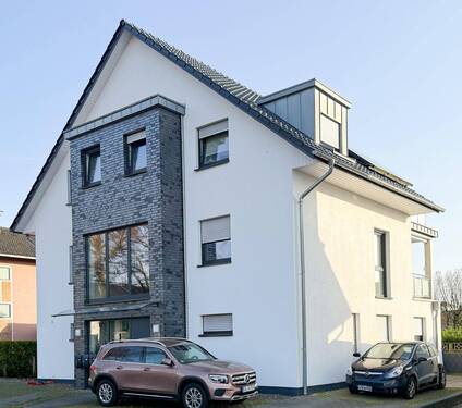 Erdgeschosswohnung im modernen Vierfamilienhaus - 