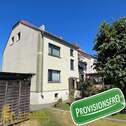 Ansicht SW - Wohnen mit Weitblick: Dachgeschosswohnung mit eigenem Garten und Büro