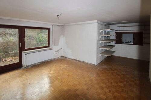 Zimmer mit Terrassenzugang im UG - 