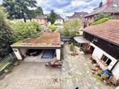 Hof-u. Garagenansicht - 9 Zimmer Mehrfamilienhaus, Wohnhaus zum Kaufen in Ilvesheim