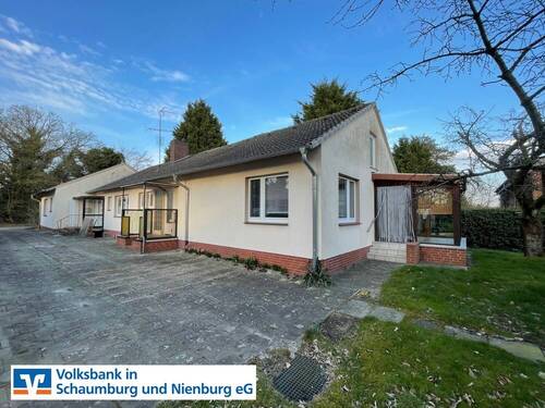 Bild 1 - Zweifamilienhaus mit Nebengebäuden auf herrlichem Grundstück