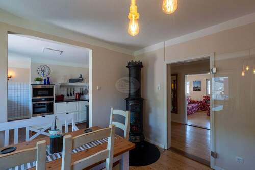 Essbereich Stadthaus mit Kamin - Mehrfamilienhaus, Wohnhaus mit 1,01 m&sup2; in Wunstorf zum Kaufen