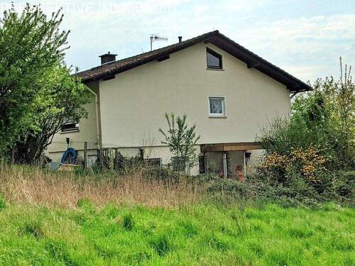 Seitenansicht - 8 Zimmer Mehrfamilienhaus, Wohnhaus zum Kaufen in Bad König