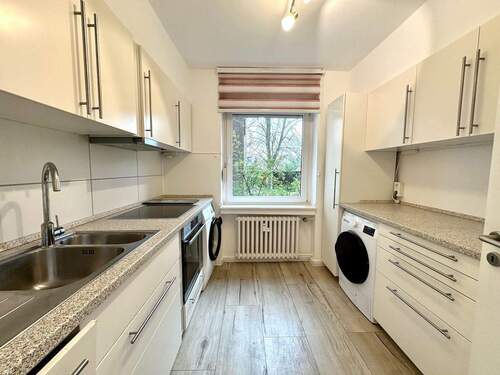 Küche - Etagenwohnung mit 76,30 m² in Kaarst zum Kaufen