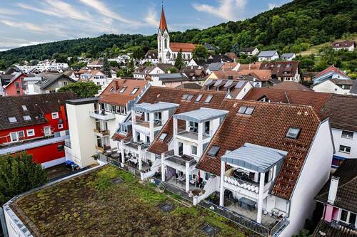 Bild 1 - Charmante 2-Zimmer-Wohnung in zentraler Lage und mit Alpen­sicht