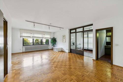 Wohnzimmer-EG - Wohnen mit Freiraum - Großzügiges Familienanwesen auf 910 m² Traumgrundstück in Rastatt