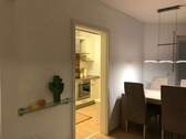 Wohnzimmer - Durchgang zur Küc - 2 Zimmer Etagenwohnung in Ingolstadt