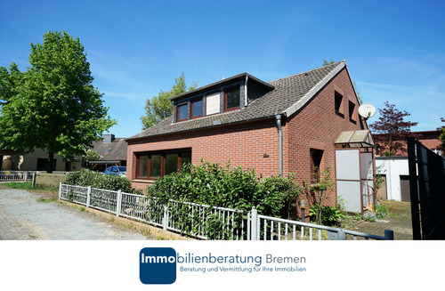 Immobiliienberatung Bremen - Einfamilienhaus mit viel Nutzfläche und zwei Garage