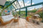 200-8587_Wintergarten_gestaged - Einfamilienhaus mit 145,40 m² in Kölln-Reisiek zum Kaufen