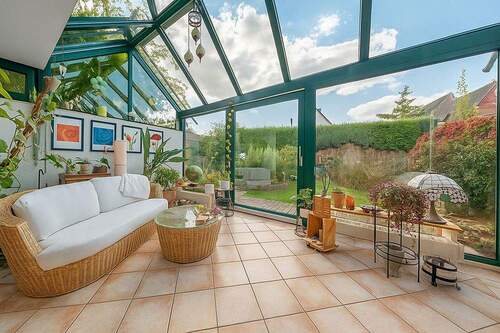 200-8587_Wintergarten_gestaged - Einfamilienhaus mit 145,40 m² in Kölln-Reisiek zum Kaufen