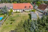 Aufnahme aus der Vogelperspektive - 1 Zimmer Mehrfamilienhaus, Wohnhaus zum Kaufen in Bad Schmiedeberg