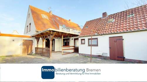 Immobilienberatung Bremen GmbH - Doppelhaushälfte mit Garage und Garten in Delmenhorst