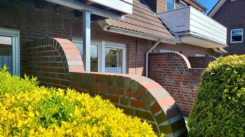 Terrassenbereich - 1 Zimmer Mehrfamilienhaus, Wohnhaus zum Kaufen in Wittmund