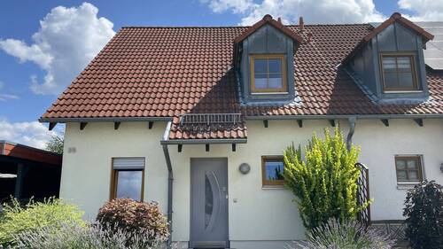 Vorderansicht - Wohnen im Familienglück - 395.000,00 EUR Kaufpreis, ca.  116,00 m² Wohnfläche