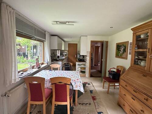 Esszimmer mit Blick zur Küche - Mehrfamilienhaus, Wohnhaus mit 210,00 m² in Rastede zum Kaufen