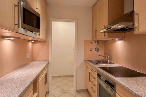 Küche mit Haushaltsraum - Etagenwohnung mit 44,90 m² in München zum Kaufen