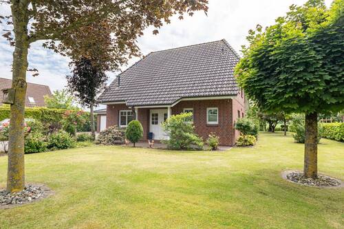 Vorderansicht - Großzügiges Einfamilienhaus mit modernem Wohnkomfort, Südterrasse und liebevoll angelegtem Garten