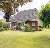 Großzügiges Einfamilienhaus mit modernem Wohnkomfort, Südterrasse und liebevoll angelegtem Garten - Engelschoff Neuland