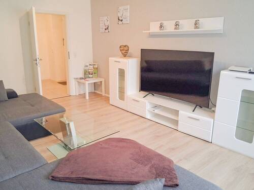 Wohnzimmer - Moderne 2-Zimmer-Wohnung mit hochwertiger Ausstattung und ca. 65 m² Wohnfläche