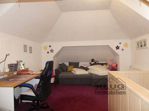 Zimmer im Dachgeschoss - 