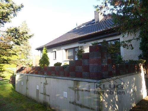 Seitliche Ansicht mit Terrasse - Einfamilienhaus mit 120,00 m² in Bergfelde zum Kaufen