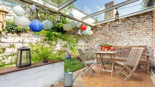 Ausblick - Besondere Wohnung im Bungalowstil in Neuss mit Terrasse, Garten und Photovoltaik