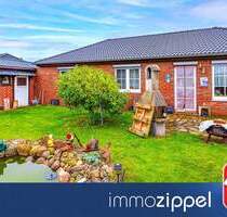 Am Feldrand in Podelzig: Klinker-Bungalow Bj.2000, 4 Zi.,G-WC, Masterbad, Kamin, Garage,648 m² Grdst
