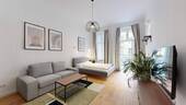 Wohnzimmer I - Altbaucharme trifft Moderne: 3-Zimmer-Wohnung mit Loggia im Herzen des Brüsseler Kiez