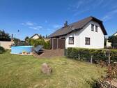 Objektrückseite und Gartenansicht - Einfamilienhaus mit 188,00 m&sup2; in Muldestausee zum Kaufen