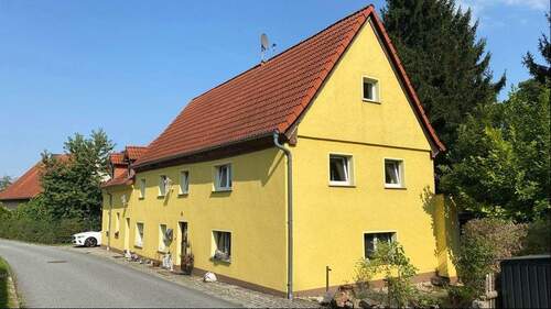 Front- und Seitenansicht - 8 Zimmer Einfamilienhaus zum Kaufen in Großhennersdorf