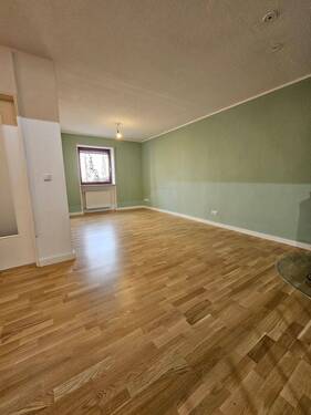 Raum Erdgeschoss mit Kaminofen - 