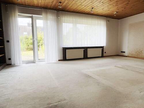  Wohnzimmer - 6 Zimmer Einfamilienhaus zum Kaufen in Greven