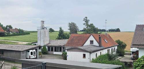 Bild1 - Wohnen & Arbeiten vereint: Gepflegtes Einfamilienhaus mit vielseitiger XL-Werkstatt