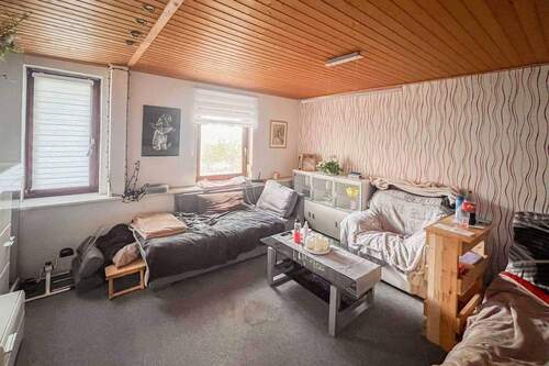 Wohnzimmer EG Haupthaus - 