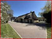Reetdachhaus aus Richtung Westen - Einfamilienhaus mit 240,10 m&sup2; in Schleswig zum Kaufen