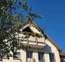 Über den Dächern von Leegebruch: Stilvolle Familienwohnung mit zwei Sonnenbalkonen