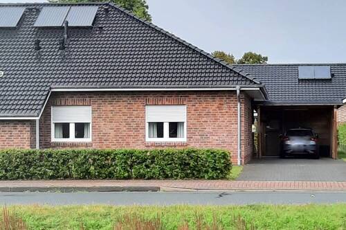 Hausansicht - Moderne, ebenerdige Doppelhaushälfte in Kanallage. Zentrumsnah.