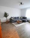 Wohnzimmer - Doppelhaushälfte mit 87,00 m² in Ostrhauderfehn zur Miete