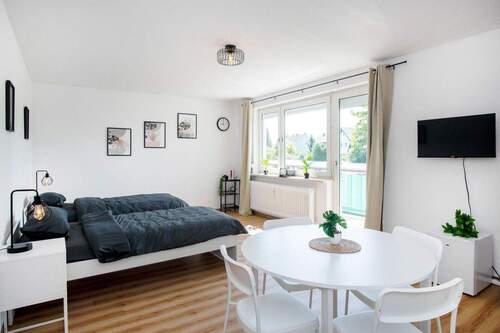 Wohnzimmmer - Blick auf Balkon - Moderne 2-Zimmer-EG-Wohnung (64 m²) mit Balkon & Garage in Erftstadt