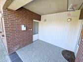 überdachter Eingang - Doppelhaushälfte mit 100,00 m² in Rhauderfehn / Rhaudermoor zum Kaufen