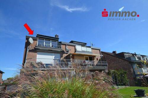 Hinteransicht mit Pfeil 3572 - Geschmackvolle Eigentumswohnung mit Garage und großem Süd-Balkon