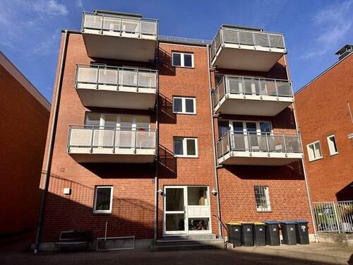 Rückansicht des Hauses - 3 Zimmer Etagenwohnung zum Kaufen in Bad Schwartau