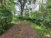 Zufahrt - Einfamilienhaus mit 140,00 m² in Apen zum Kaufen