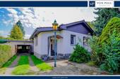 Bild 1 - Sanierungsobjekt mit Potenzial: Bungalow auf großzügigem Grundstück in ruhiger Lage
