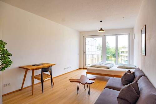 Wohnzimmer - Ansicht II - 1 Zimmer Etagenwohnung in München